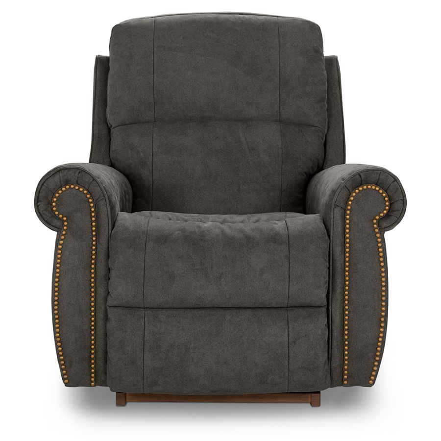 Dark gray upholstered recliner chair with rolled arms and brass nailhead trim.